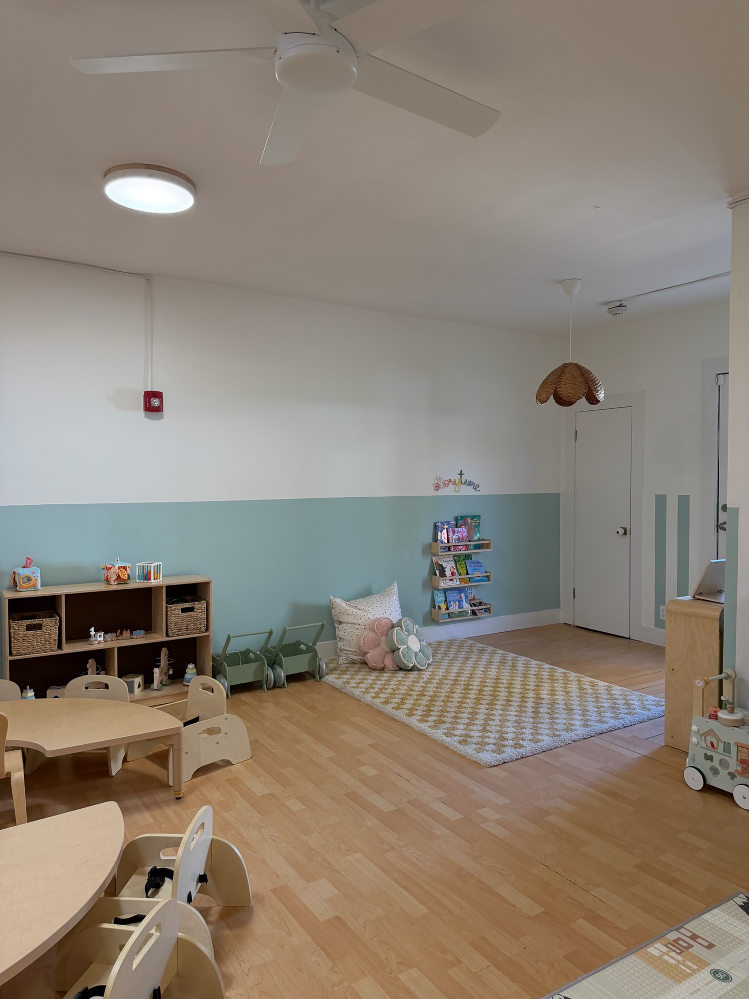 Happy Nook toddler and preschool classroom — storytime corner and cozy reading nook