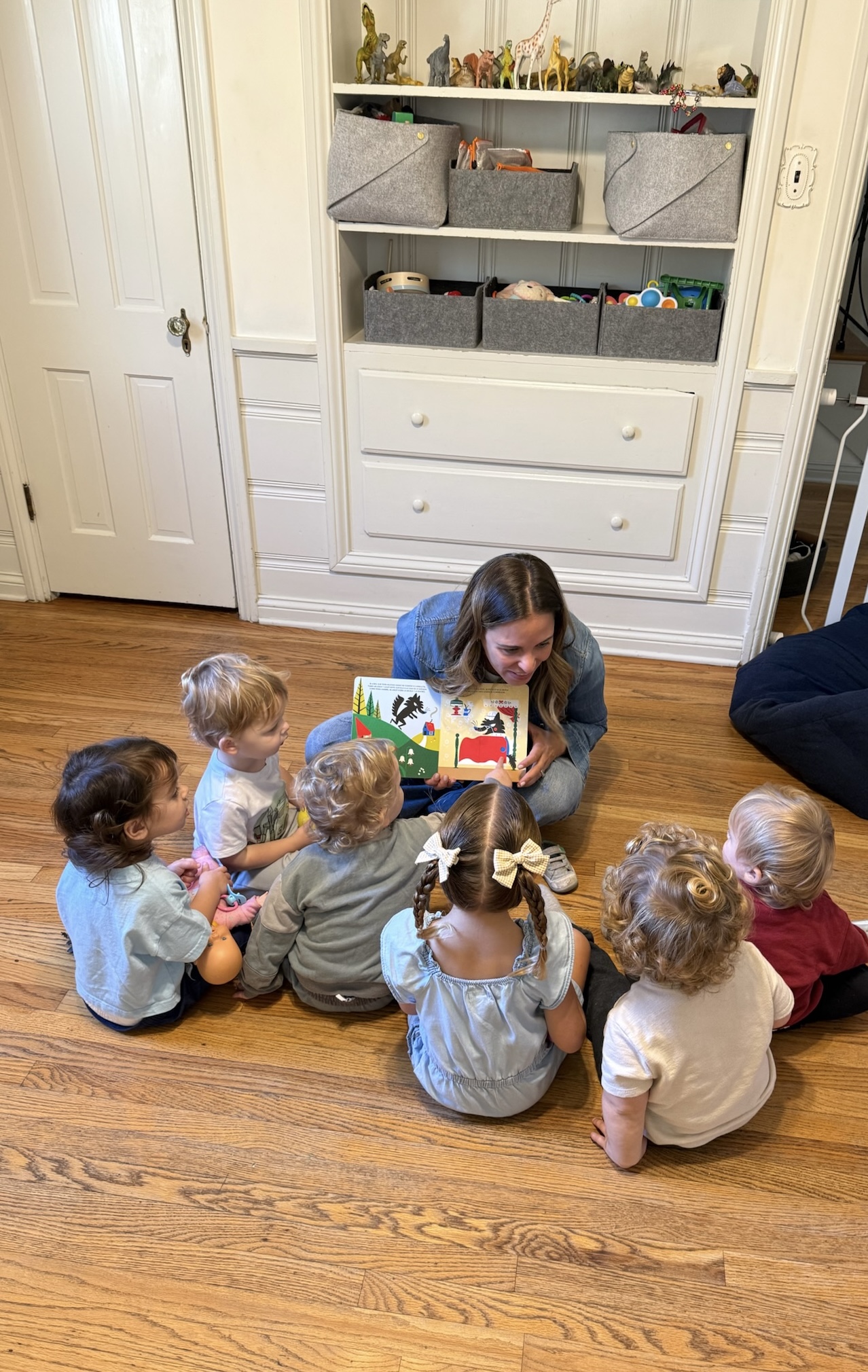 Priscilla Mazon, Founder of Happy Nook, reading to children